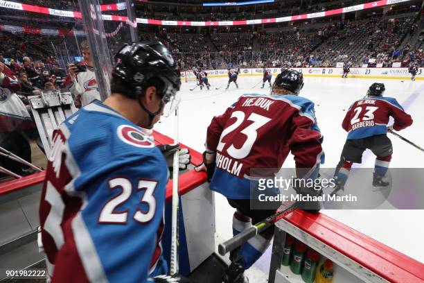 Nail Yakupov, Anton Lindholm and Mark Barberio of the Colorado Avalanche take to the ice prior to the game in Milan Hejduk warm up jerseys at the...
