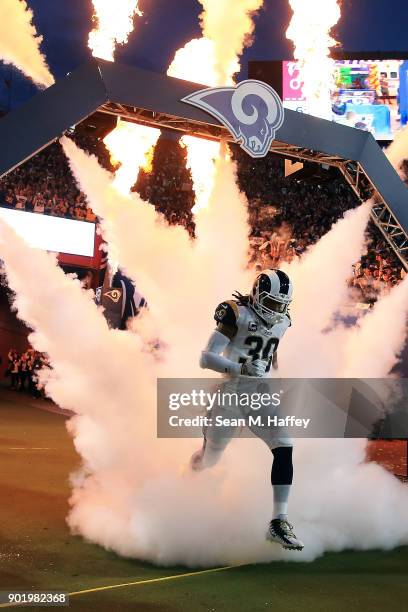 Todd Gurley of the Los Angeles Rams runs onto the field prior to the NFC Wild Card Playoff Game against the Atlanta Falcons at the Los Angeles...