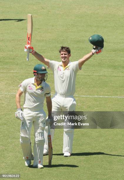 Mitch Marsh of Australia celebrates his century with brother Shaun Marsh during day four of the Fifth Test match in the 2017/18 Ashes Series between...