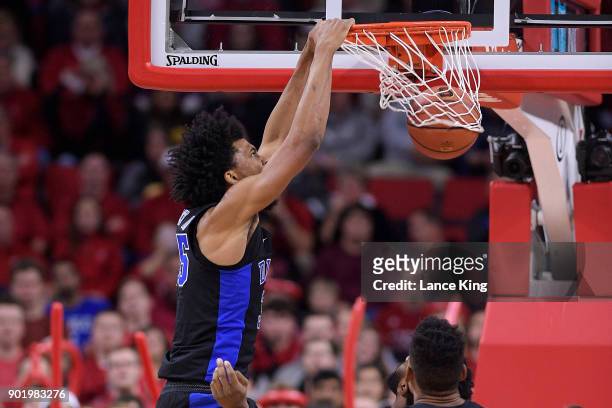 Marvin Bagley III of the Duke Blue Devils dunks the ball against the North Carolina State Wolfpack at PNC Arena on January 6, 2018 in Raleigh, North...