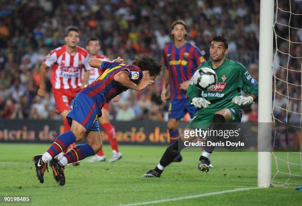 Bojan Krkic of Barcelona scores Barcelona's first goal during the La Liga match between Barcelona and Sporting Gijon at the Nou Camp stadium on...