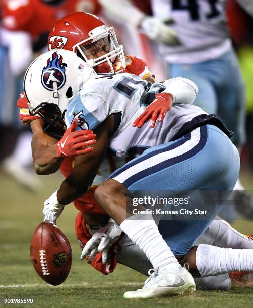 Kansas City Chiefs wide receiver Jehu Chesson tackles Tennessee Titans cornerback Adoree' Jackson after Jackson muffed a punt catch for a turnover on...