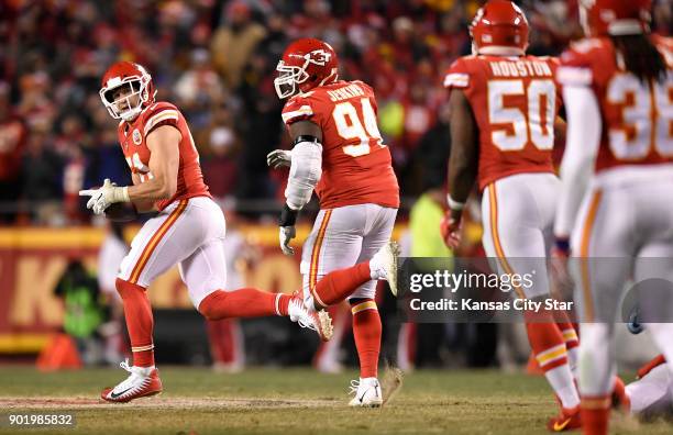 Kansas City Chiefs outside linebacker Frank Zombo picks up an apparent fumble from Tennessee Titans quarterback Marcus Mariota in the fourth quarter,...