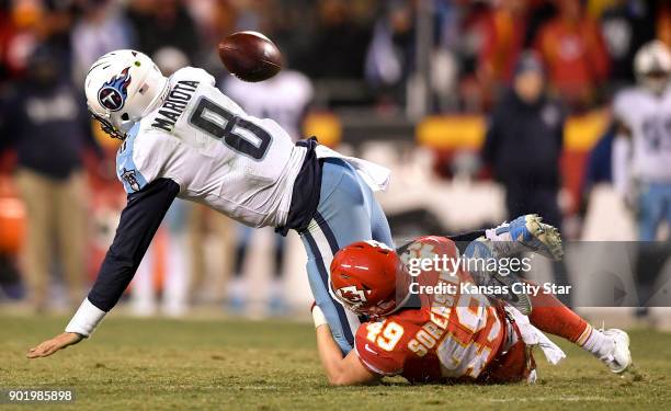Kansas City Chiefs strong safety Daniel Sorensen sacks Tennessee Titans quarterback Marcus Mariota , but the fumble was ruled down by forward...