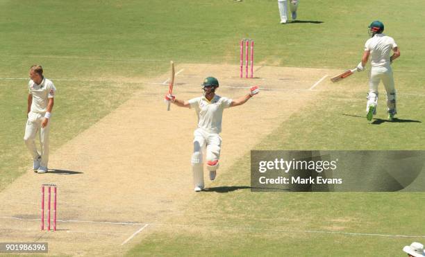 Mitch Marsh of Australia celebrates his century during day four of the Fifth Test match in the 2017/18 Ashes Series between Australia and England at...