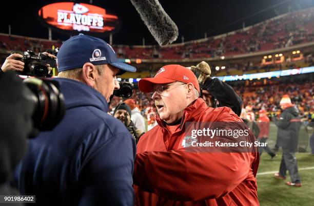 Kansas City Chiefs head coach Andy Reid greets Tennessee Titans head coach Mike Mularkey after a 22-21 loss to the Titans on Saturday, Jan. 6 during...