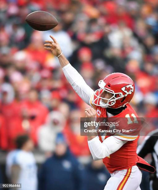 Kansas City Chiefs quarterback Alex Smith delivers a pass in the first quarter against the Tennessee Titans on Saturday, Jan. 6 during the AFC Wild...