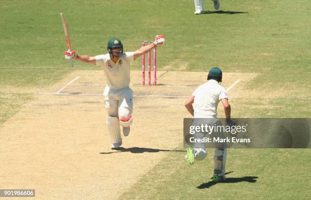 Mitch Marsh of Australia celebrates his century during day four of the Fifth Test match in the 2017/18 Ashes Series between Australia and England at...