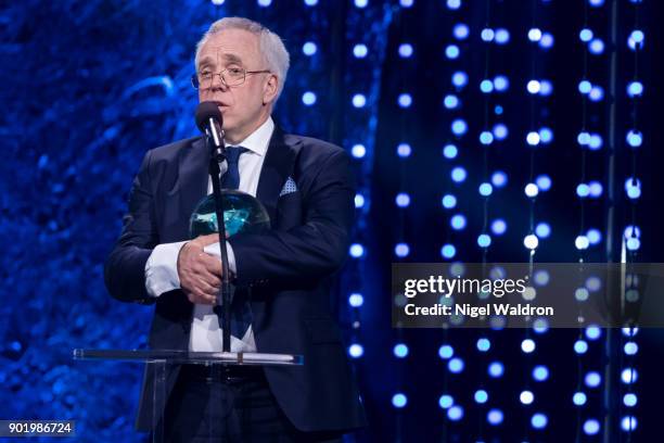 Leif Olav Alnes receives the award from Trond espen seim during the Sport Gala Awards at Olympic Amphitheater on January 6, 2018 in Hamar, Norway.