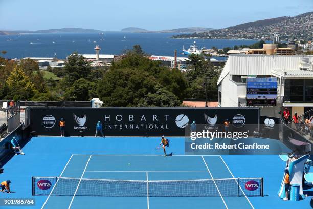 Beatriz Haddad Maia of Brazil serves during her singles match against Lizette Cabrera of Australia on Day One of 2018 Hobart International match at...