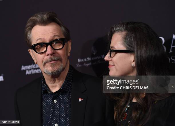 Actor Gary Oldman and his wife Gisele Schmidt arrive for the BAFTA Los Angeles Awards Season Tea Party at the Four Season Hotel in Beverly Hills,...