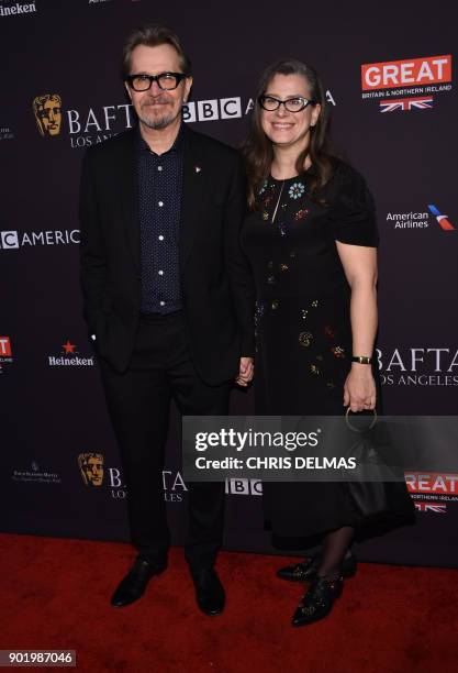 Actor Gary Oldman and his wife Gisele Schmidt arrive for the BAFTA Los Angeles Awards Season Tea Party at the Four Season Hotel in Beverly Hills,...