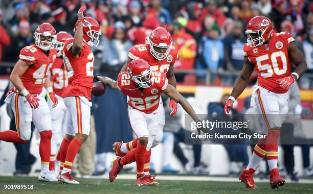 Kansas City Chiefs cornerback Marcus Peters appears to be bowling as he celebrates an interception in the second quarter against the Tennessee Titans...