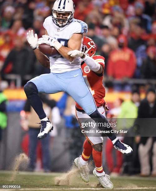The Tennessee Titans' Eric Decker catches a touchdown pass in front of Kansas City Chiefs cornerback Eric Murray to give the Titatn's the lead in the...