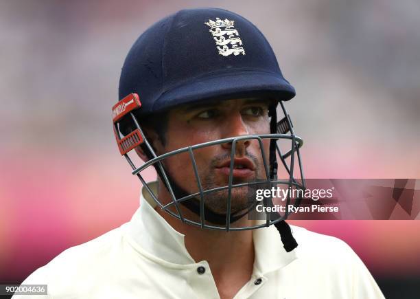 Alastair Cook of England looks dejected after being dismissed by Nathan Lyon of Australia during day four of the Fifth Test match in the 2017/18...