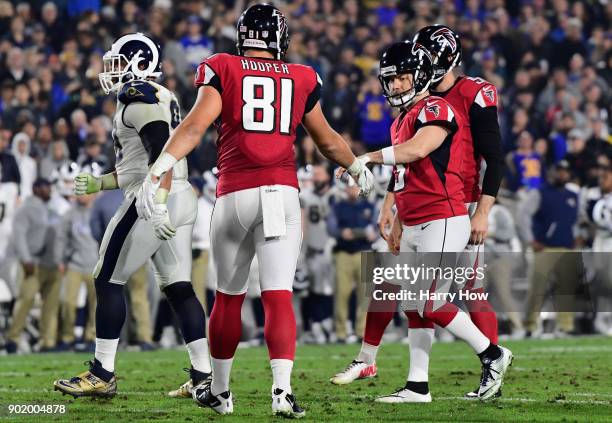 Kicker Matt Bryant of the Atlanta Falcons celebrates his field goal with tight end Austin Hooper to take a 16-10 lead in the third quarter of the NFC...