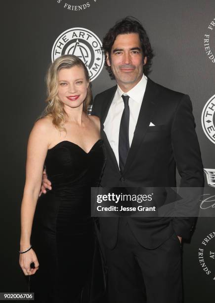 Amy Smart and Ccarter Oosterhouse attend The Art Of Elysium's 11th Annual Celebration on January 6, 2018 in Santa Monica, California.