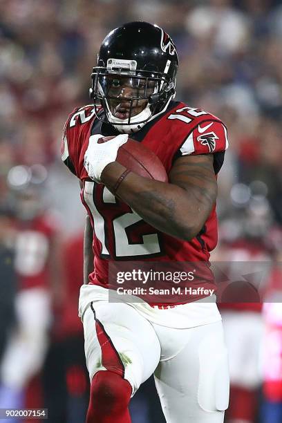 Mohamed Sanu of the Atlanta Falcons runs the ball during the NFC Wild Card Playoff Game against the Los Angeles Rams at the Los Angeles Coliseum on...