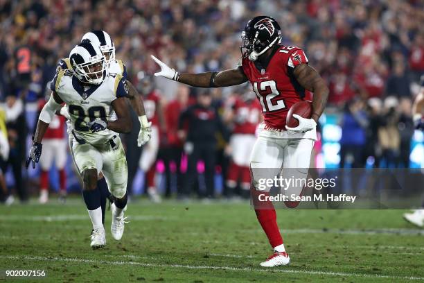 Mohamed Sanu of the Atlanta Falcons runs the ball during the NFC Wild Card Playoff Game against the Los Angeles Rams at the Los Angeles Coliseum on...