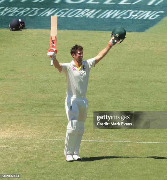 Mitch Marsh of Australia celebrates his century during day four of the Fifth Test match in the 2017/18 Ashes Series between Australia and England at...