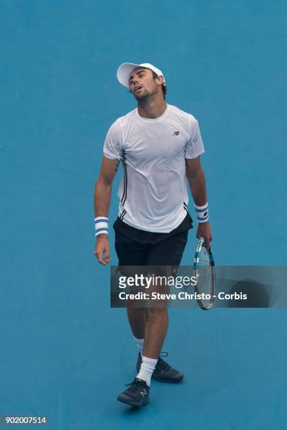 Jordan Thompson of Australia reacts to missing a point in his first round match against Paolo Lorenzi of Italy during day one of the 2018 Sydney...