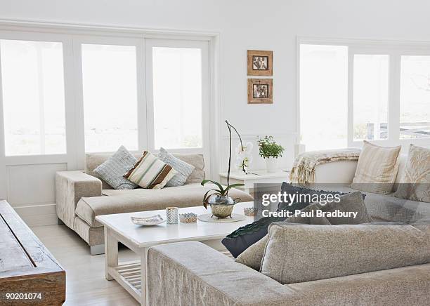 living room of modern home - coffee table stock pictures, royalty-free photos & images