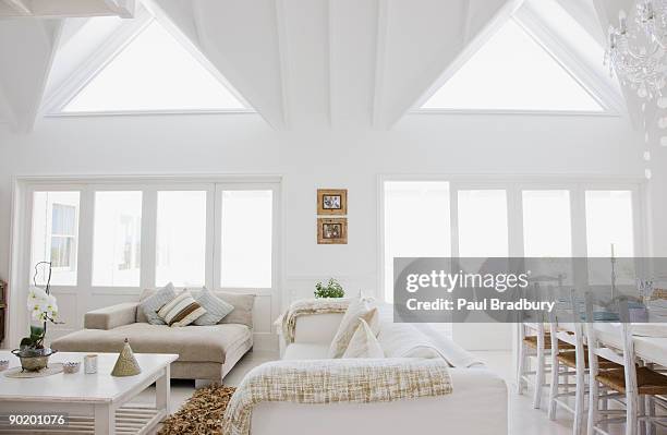 living room in modern home - glass ceiling stock pictures, royalty-free photos & images