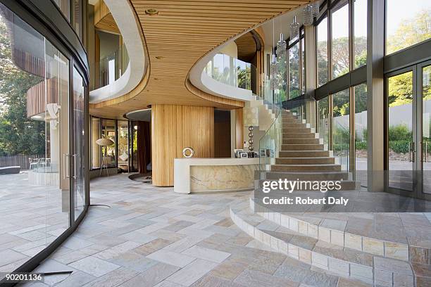 staircase and entryway of modern home - landing home interior stock pictures, royalty-free photos & images