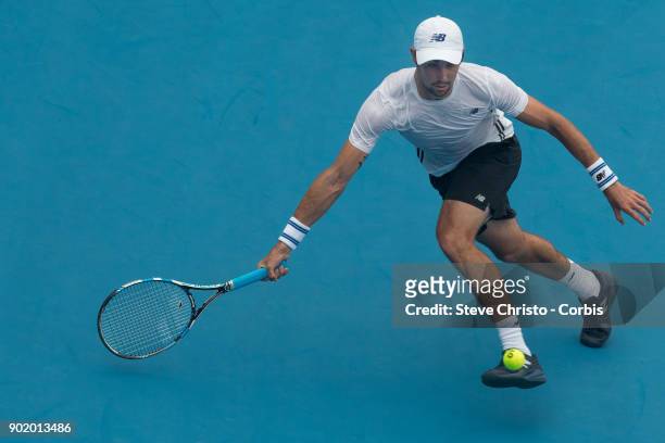 Jordan Thompson of Australia plays a forehand in his first round match against Paolo Lorenzi of Italy during day one of the 2018 Sydney International...