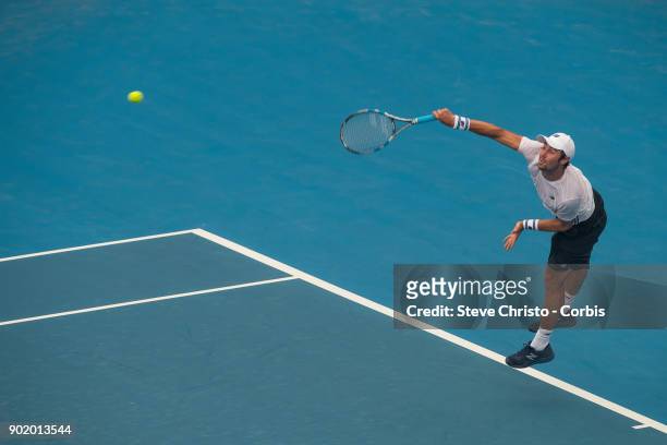 Jordan Thompson of Austraila serves in his first round match against Paolo Lorenzi of Italy during day one of the 2018 Sydney International at Sydney...