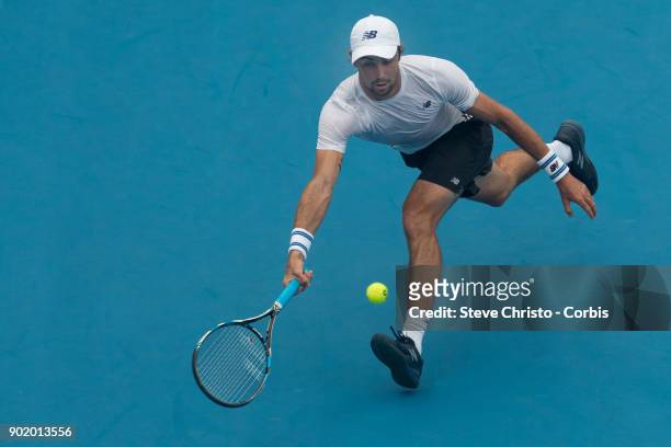 Jordan Thompson of Australia plays a forehand in his first round match against Paolo Lorenzi of Italy during day one of the 2018 Sydney International...