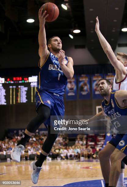 Brisbane player Adam Gibson shoots the ball during the round 13 NBL match between the Brisbane Bullets and the Adelaide 36ers at Brisbane Convention...