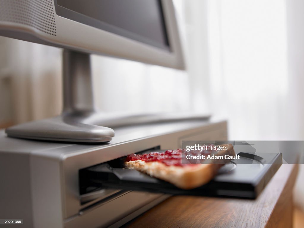 Toast And Jam On Computer Disc Drive High-Res Stock Photo - Getty Images
