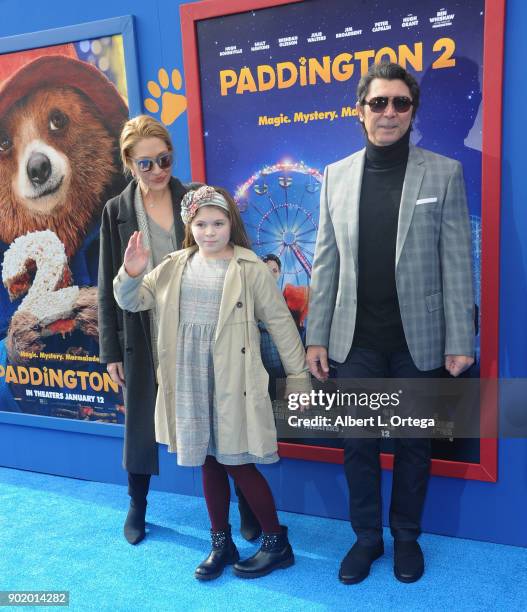 Actress Yvonne Boismier Phillips, Indigo Sanara Phillips and actor Lou Diamond Phillips arrive for the premiere of Warner Bros. Pictures' "Paddington...