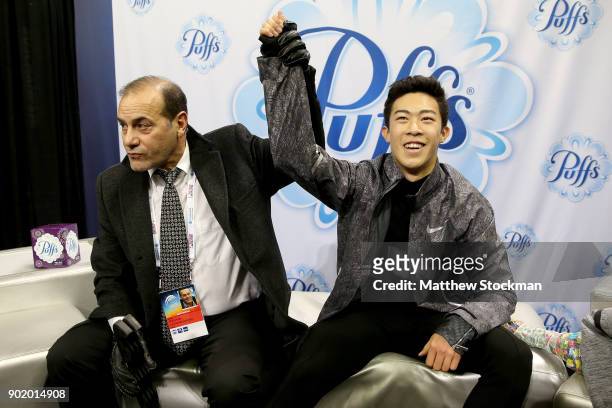 Nathan Chen celebrates in the kiss and cry with his coach Rafael Arutunian after skating in the the Men's Free Skate during the 2018 Prudential U.S....