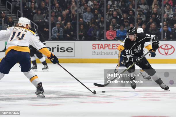 Nick Shore of the Los Angeles Kings battles for the puck against Mattias Ekholm of the Nashville Predators at STAPLES Center on January 6, 2018 in...