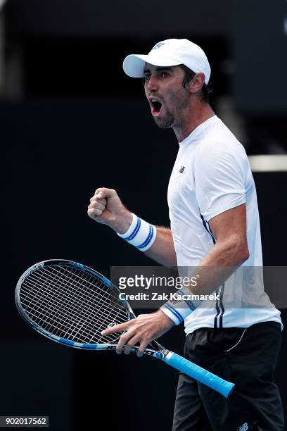 Jordan Thompson of Australia reacts after winning a point in his first round match against Paolo Lorentzi of Italy during day one of the 2018 Sydney...