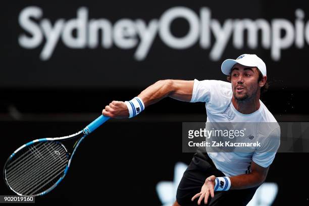 Jordan Thompson of Australia serves in his first round match against Paolo Lorentzi of Italy during day one of the 2018 Sydney International at...
