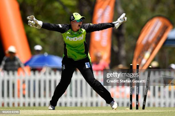 Rachel Priest of the Thunder successfully appeals the runout of Mathilda Carmichael of the Scorchers during the Women's Big Bash League match between...