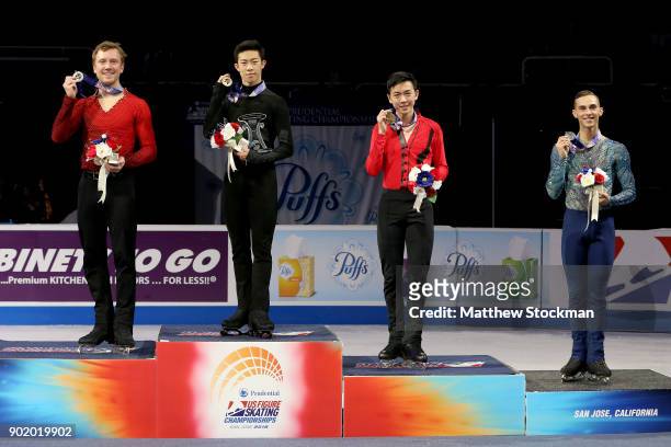 Ross Miner, Nathan Chen, Vincent Zhou and Adam Rippon pose for photographers after the medal ceremony for the Championship Men's during the 2018...