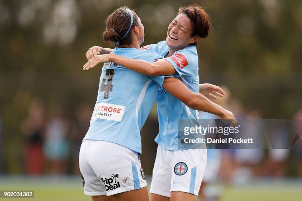 Yukari Kinga of Melbourne City celebrates a goal with Ashley Hatch of Melbourne City during the round ten W-League match between Melbourne City and...