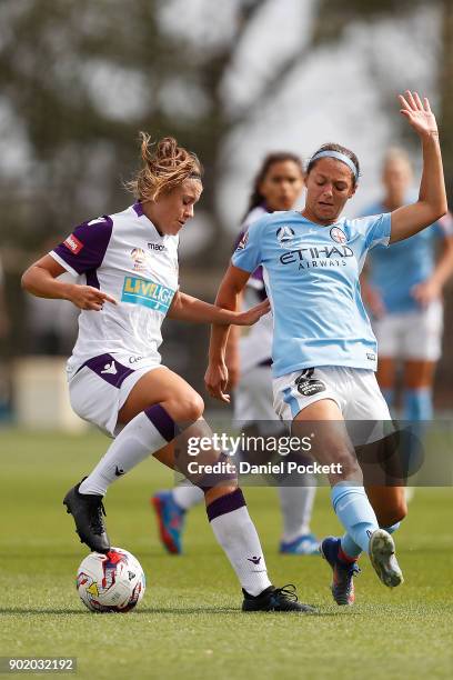 Natasha Rigby of Perth Glory and Ashley Hatch of Melbourne City contest the ball during the round ten W-League match between Melbourne City and Perth...