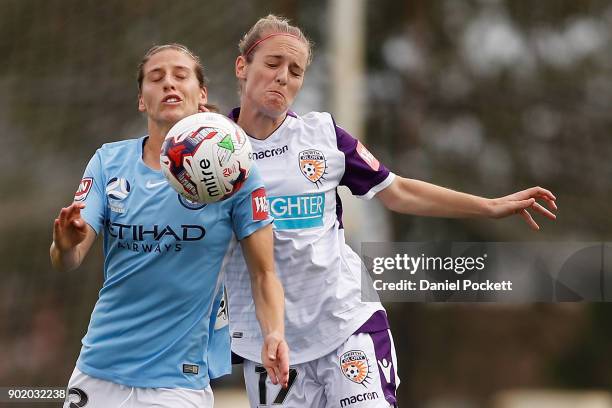 Rebekah Stott of Melbourne City and Marianna Tabin of Perth Glory contest the ball during the round ten W-League match between Melbourne City and...
