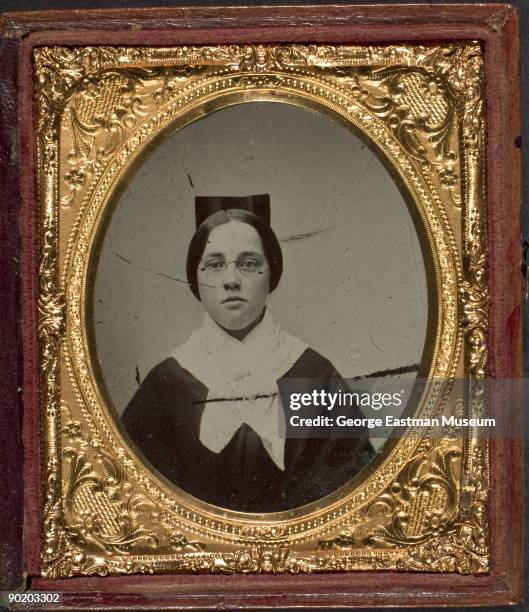 Head and shoulders portrait of an unidentified nurse from the American Civil War, ca. 1863.