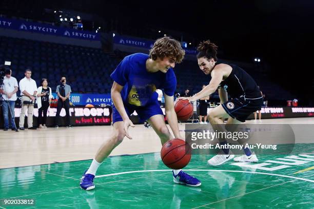 Tennis player Stefanos Tsitsipas of Greece from the ASB Classic tennis tournament takes part in a game of basketball with the Breakers prior to the...