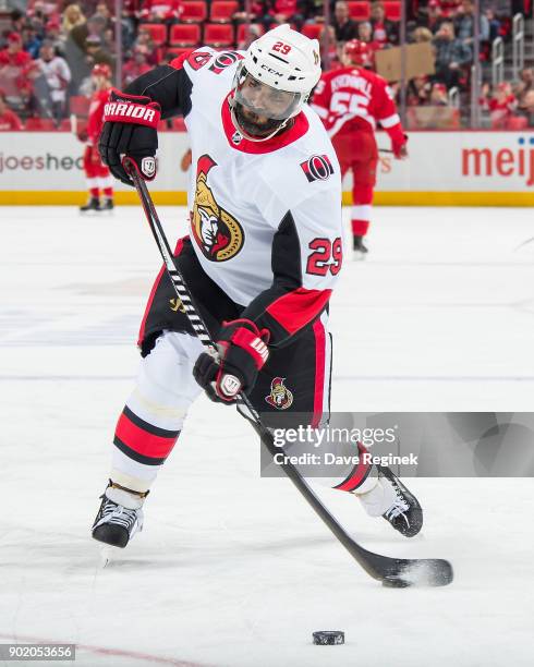 Johnny Oduya of the Ottawa Senators shoots the puck in warm-ups prior to an NHL game against the Detroit Red Wings at Little Caesars Arena on January...