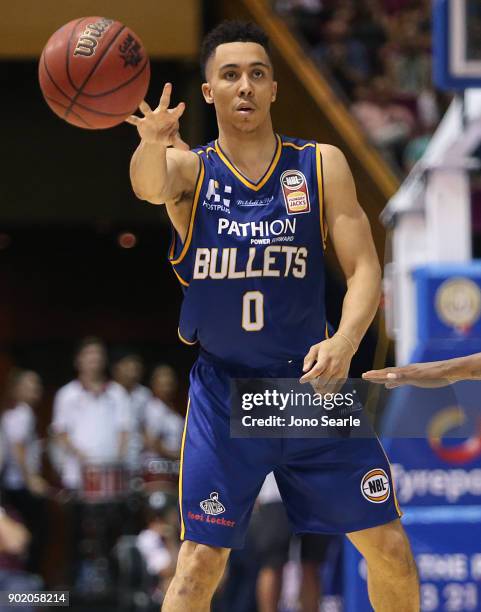 Brisbane player Travis Trice passes the ball during the round 13 NBL match between the Brisbane Bullets and the Adelaide 36ers at Brisbane Convention...