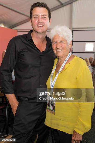 Country & western singer Adam Harvey and swimming legend Dawn Fraser attend Magic Millions Polo on January 7, 2018 in Gold Coast, Australia.