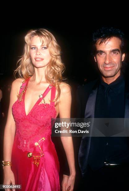 Model Claudia Schiffer and boyfriend magician David Copperfield attend the 66th Annual Academy Awards on March 21, 1994 at the Dorothy Chandler...