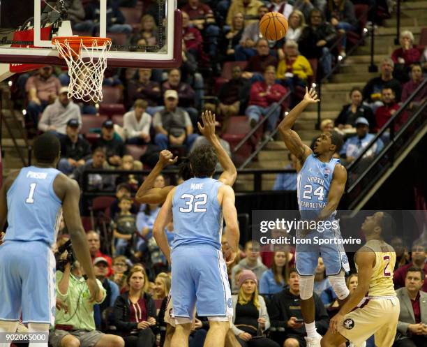 North Carolina guard Kenny Williams shoots the ball during the game between the North Carolina Tar Heels and the Florida State Seminoles at the...